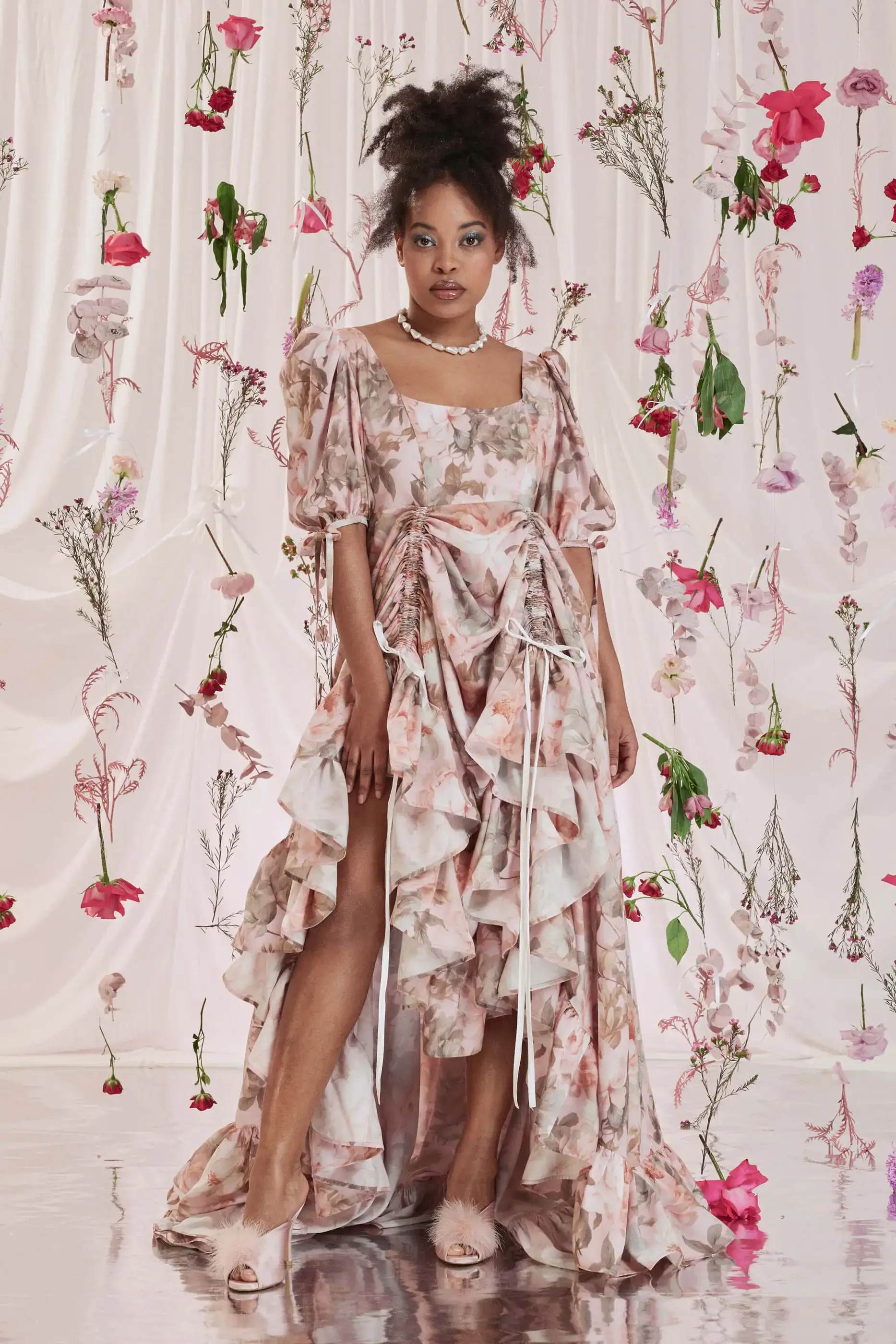 Archive Sale Gloria Bustle Gown In Floral Print 4 Gloria Bustle Gown In Floral Print Gloria bustle gown in floral print DISCLAIMER: Please note that all items within the Archive Sale are not eligible for returns. Some of the items in the Archive Sale may be production samples and may have been used for the collection photoshooting. It may have small flaws, however no rips or anything major that would make the iten unsuitable for wear. If you would like to receive photos of the item you are ordering, please feel free to get in touch and we will gladly photograph it for you.