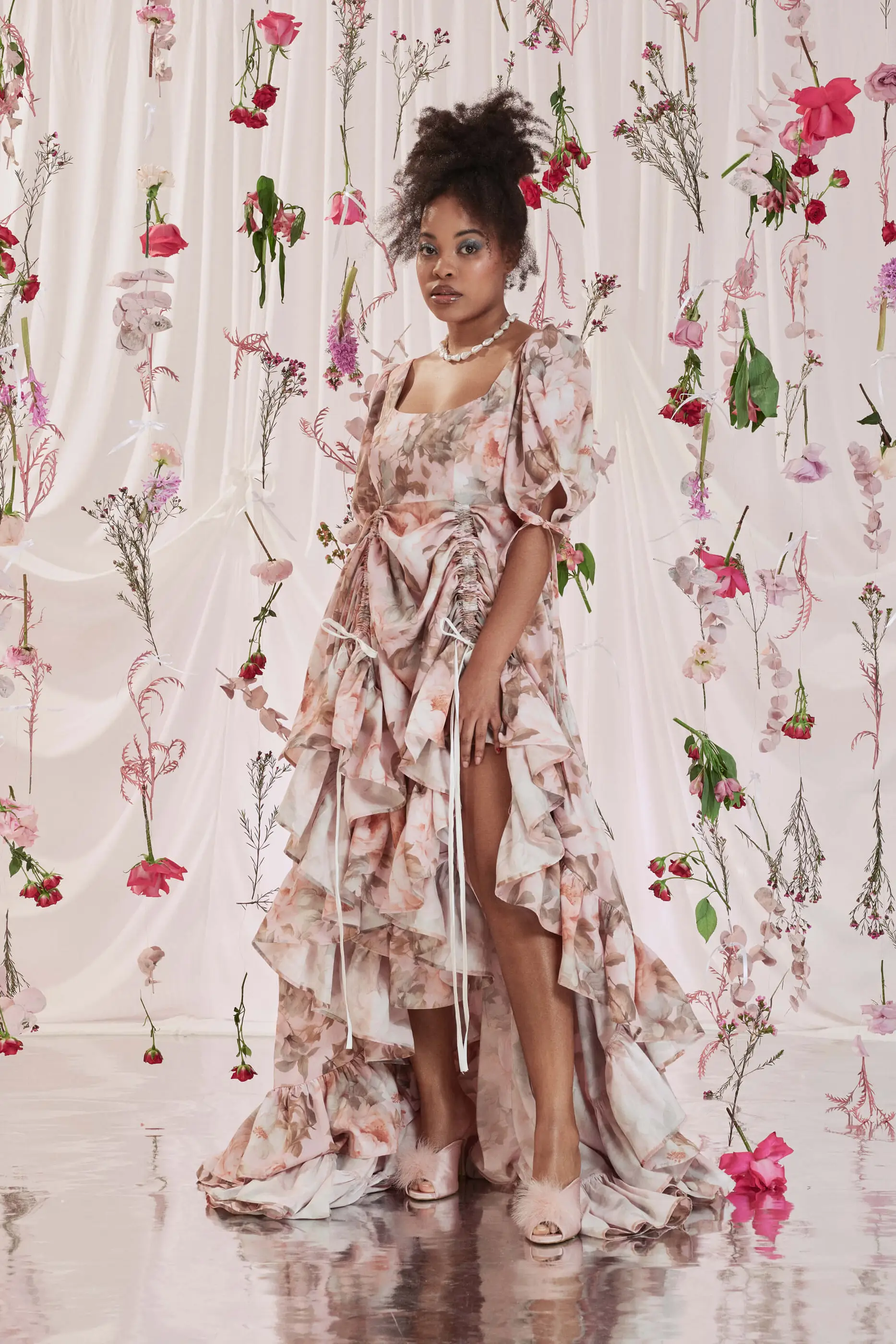 Archive Sale Gloria Bustle Gown In Floral Print 5 Gloria Bustle Gown In Floral Print Gloria bustle gown in floral print DISCLAIMER: Please note that all items within the Archive Sale are not eligible for returns. Some of the items in the Archive Sale may be production samples and may have been used for the collection photoshooting. It may have small flaws, however no rips or anything major that would make the iten unsuitable for wear. If you would like to receive photos of the item you are ordering, please feel free to get in touch and we will gladly photograph it for you.
