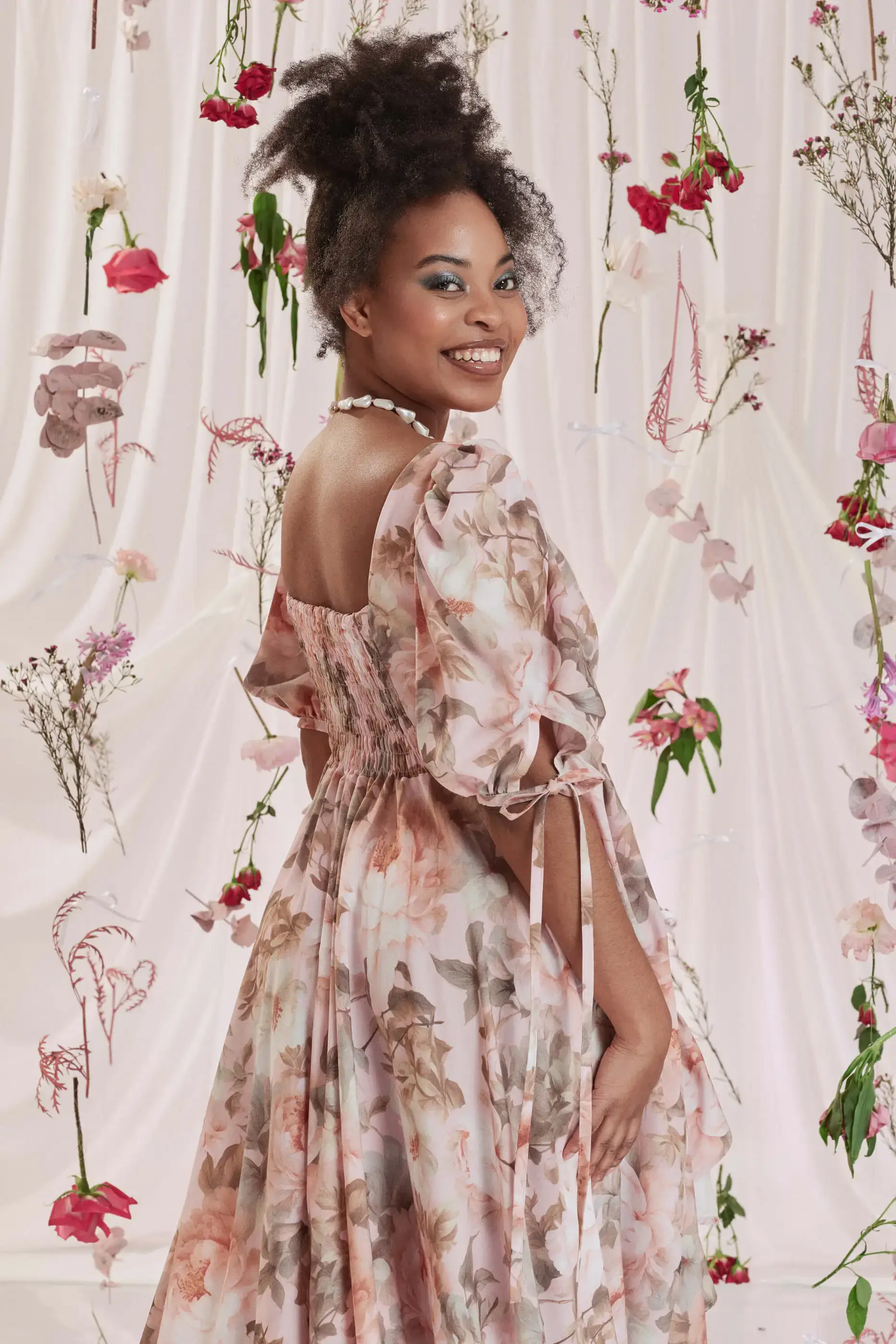 Archive Sale Gloria Bustle Gown In Floral Print 8 Gloria Bustle Gown In Floral Print Gloria bustle gown in floral print DISCLAIMER: Please note that all items within the Archive Sale are not eligible for returns. Some of the items in the Archive Sale may be production samples and may have been used for the collection photoshooting. It may have small flaws, however no rips or anything major that would make the iten unsuitable for wear. If you would like to receive photos of the item you are ordering, please feel free to get in touch and we will gladly photograph it for you.