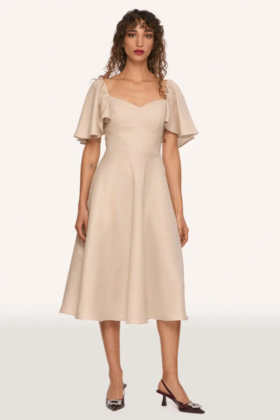 Nehanda sweetheart dress in beige - DISCLAIMER: Please note that all items within the Archive Sale are not eligible for returns. Some of the items in the Archive Sale may be production samples and may have been used for the collection photoshooting. It may have small flaws, however no rips or anything major that would make the iten unsuitable for wear. If you would like to receive photos of the item you are ordering, please feel free to get in touch and we will gladly photograph it for you.