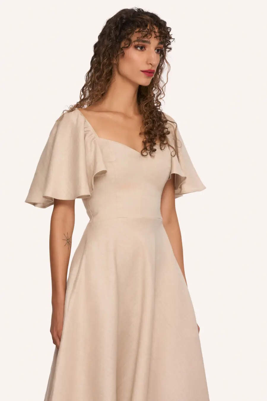 Nehanda sweetheart dress in beige - DISCLAIMER: Please note that all items within the Archive Sale are not eligible for returns. Some of the items in the Archive Sale may be production samples and may have been used for the collection photoshooting. It may have small flaws, however no rips or anything major that would make the iten unsuitable for wear. If you would like to receive photos of the item you are ordering, please feel free to get in touch and we will gladly photograph it for you.