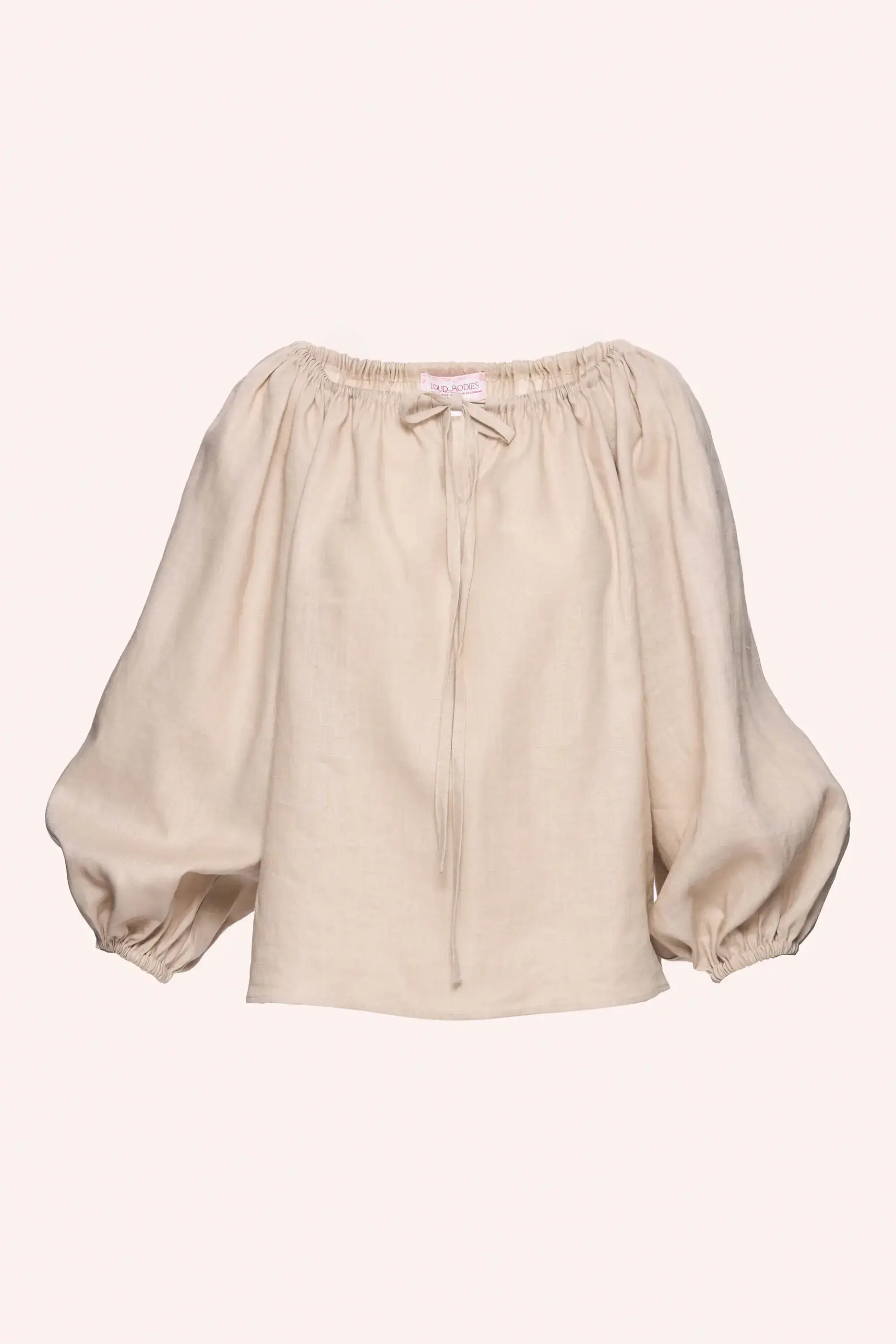 Archive Sale Oodgeroo Peasant Shirt In Beige 1 Oodgeroo Peasant Shirt In Beige Oodgeroo peasant shirt in beige DISCLAIMER: Please note that all items within the Archive Sale are not eligible for returns. Some of the items in the Archive Sale may be production samples and may have been used for the collection photoshooting. It may have small flaws, however no rips or anything major that would make the iten unsuitable for wear. If you would like to receive photos of the item you are ordering, please feel free to get in touch and we will gladly photograph it for you.