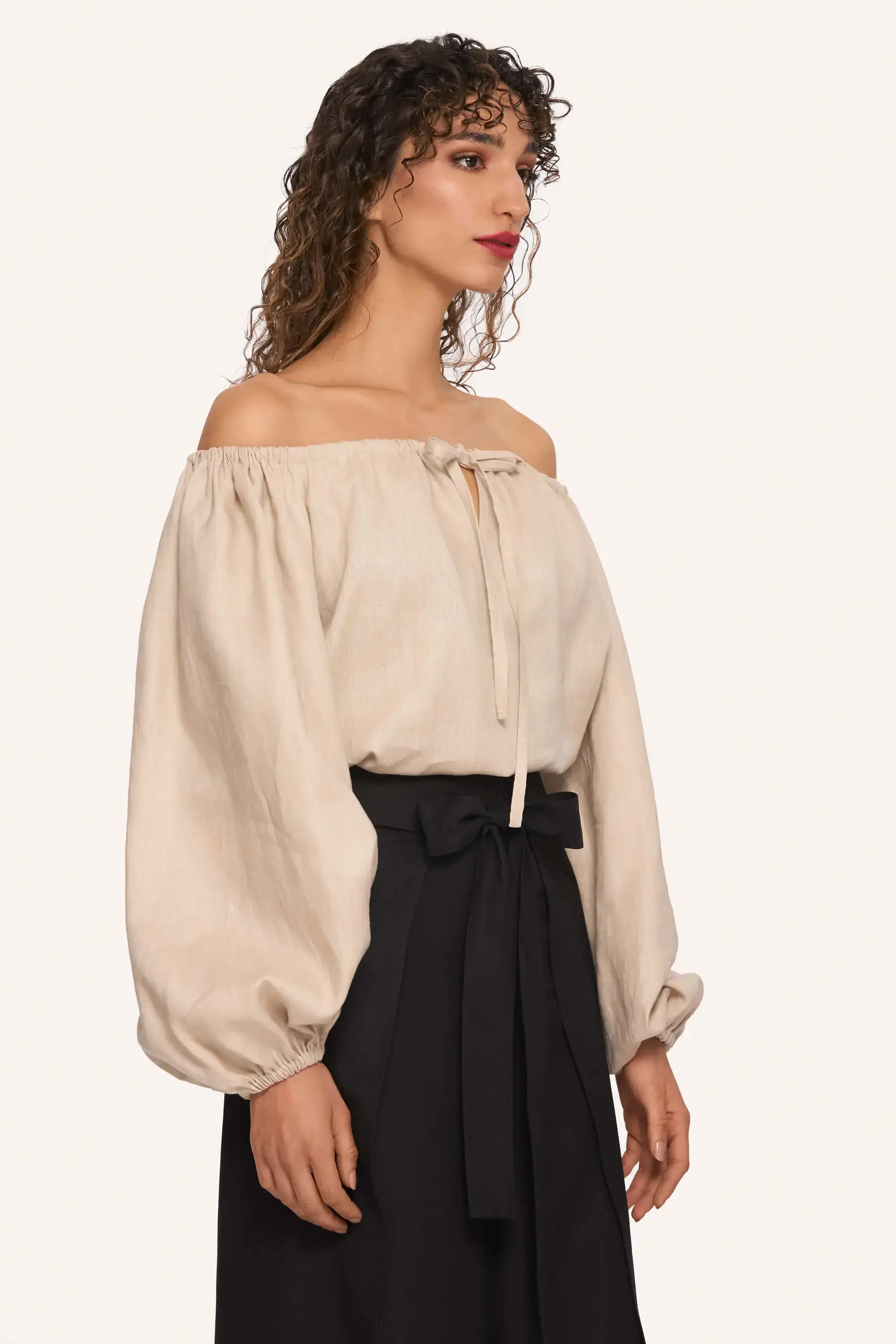 Archive Sale Oodgeroo Peasant Shirt In Beige 5 Oodgeroo Peasant Shirt In Beige Oodgeroo peasant shirt in beige DISCLAIMER: Please note that all items within the Archive Sale are not eligible for returns. Some of the items in the Archive Sale may be production samples and may have been used for the collection photoshooting. It may have small flaws, however no rips or anything major that would make the iten unsuitable for wear. If you would like to receive photos of the item you are ordering, please feel free to get in touch and we will gladly photograph it for you.