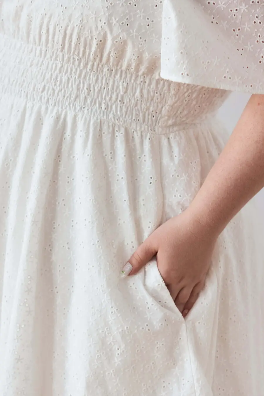 Audre ruched midi dress in embroidered white - A romantic midi dress with a square neckline, puffed short sleeves, and a comfortable smocked waist, crafted from pink gingham.