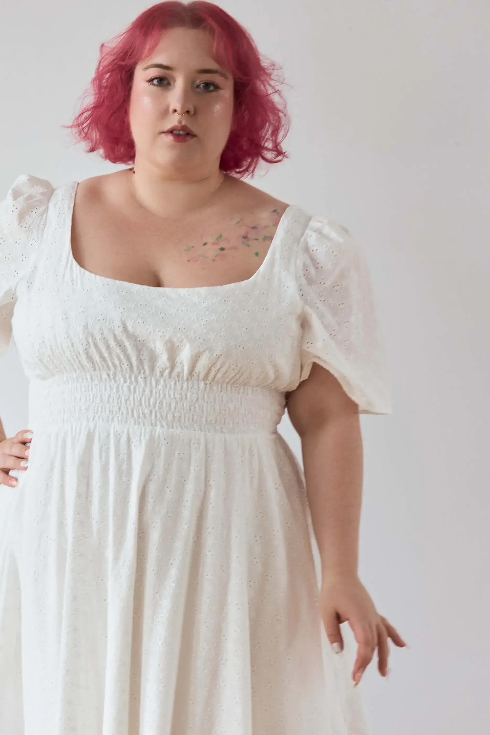 Summer 2025 Audre Ruched Midi Dress In Embroidered White 6 Audre Ruched Midi Dress In Embroidered White Audre ruched midi dress in embroidered white A romantic midi dress with a square neckline, puffed short sleeves, and a comfortable smocked waist, crafted from pink gingham.