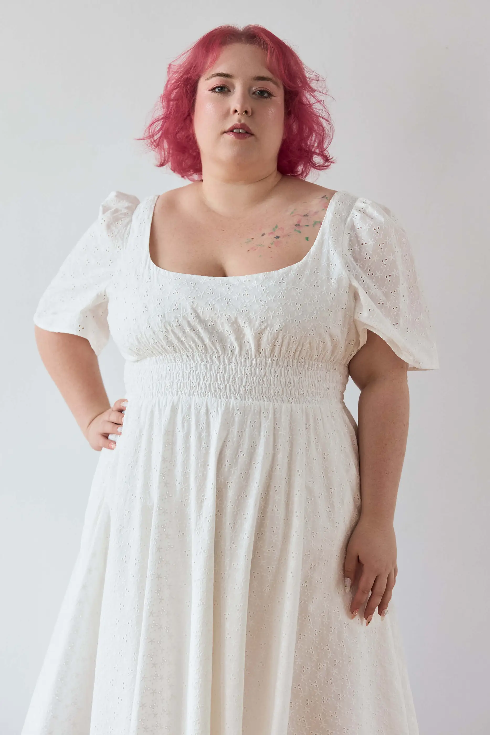 Summer 2025 Audre Ruched Midi Dress In Embroidered White 7 Audre Ruched Midi Dress In Embroidered White Audre ruched midi dress in embroidered white A romantic midi dress with a square neckline, puffed short sleeves, and a comfortable smocked waist, crafted from pink gingham.