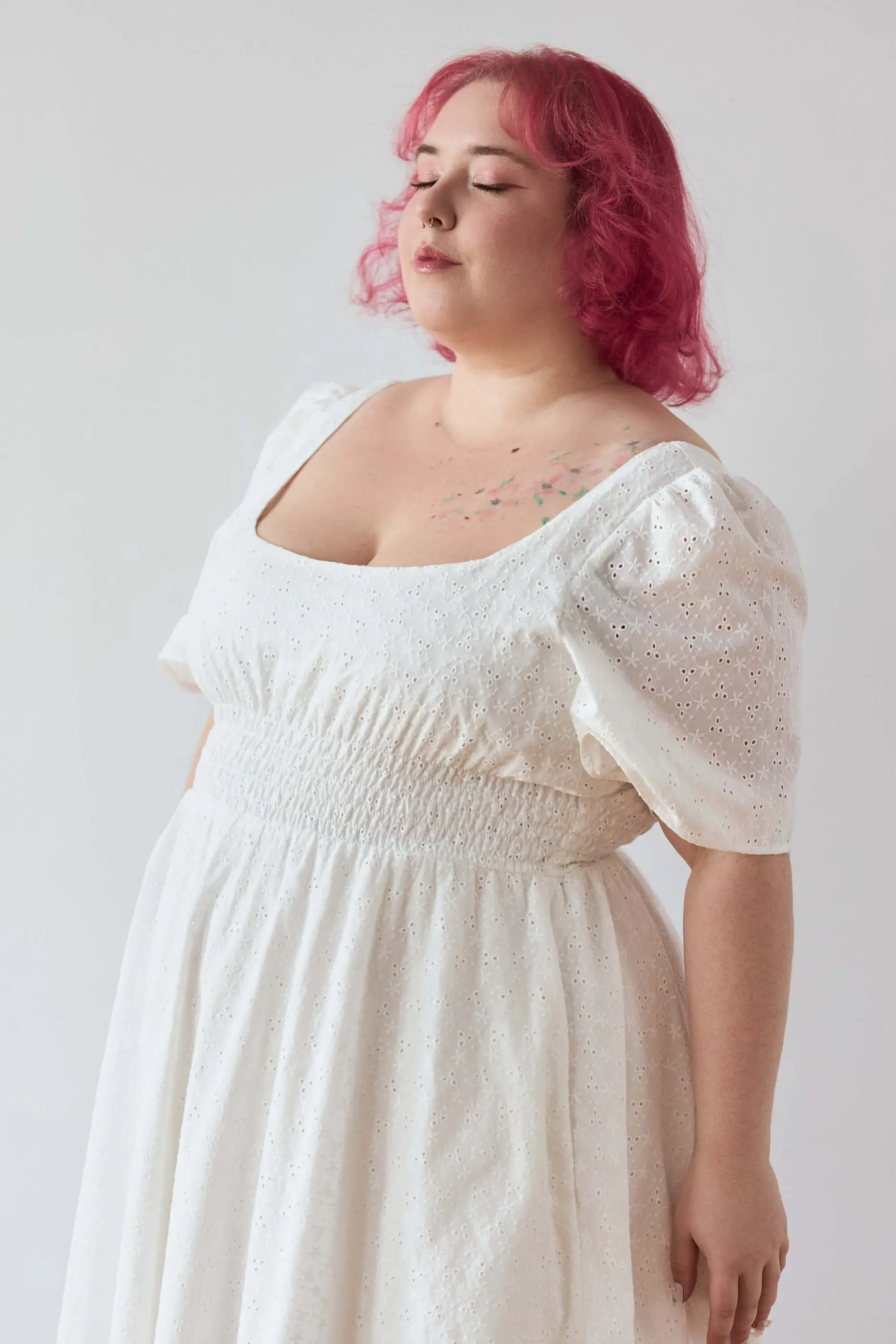 Summer 2025 Audre Ruched Midi Dress In Embroidered White 8 Audre Ruched Midi Dress In Embroidered White Audre ruched midi dress in embroidered white A romantic midi dress with a square neckline, puffed short sleeves, and a comfortable smocked waist, crafted from pink gingham.