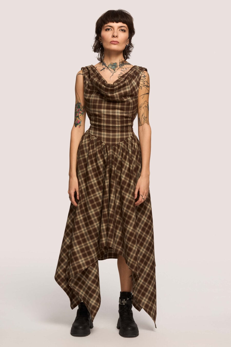 Delta of Venus corset dress in chestnut plaid  A silhouette that doesn’t ask you to shrink.