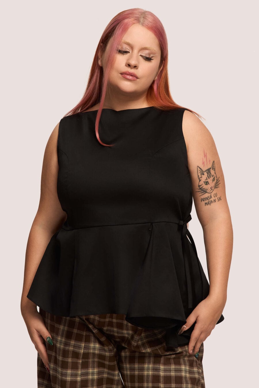 Invisibility Blues sleeveless shirt in raven - A silhouette that moulds to your shape, not the world’s expectations.