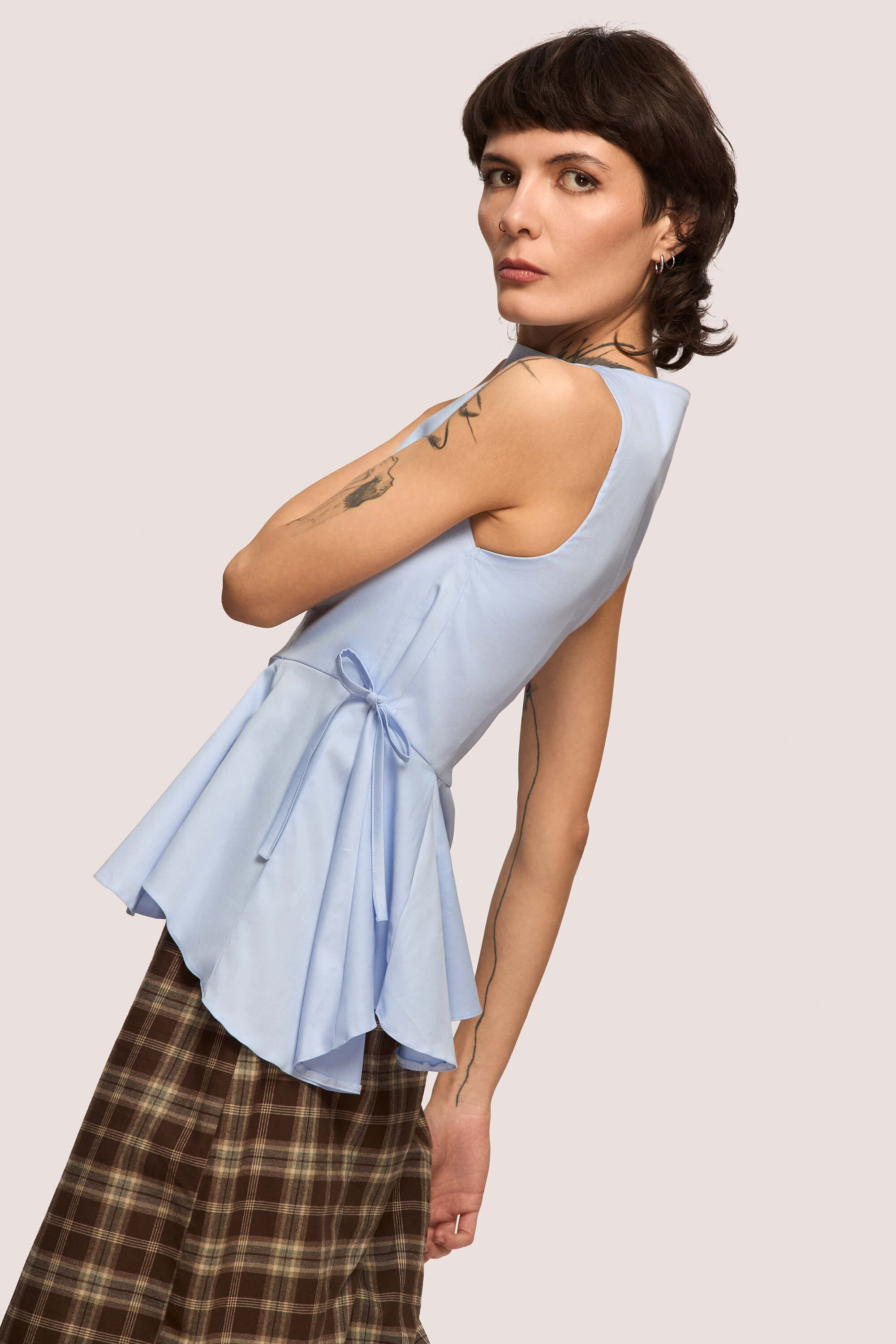 Winter 2025 Invisibility Blues Sleeveless Shirt In Sky Blue 3 Invisibility Blues Sleeveless Shirt In Sky Blue Invisibility Blues sleeveless shirt in sky blue A silhouette that moulds to your shape, not the world’s expectations.