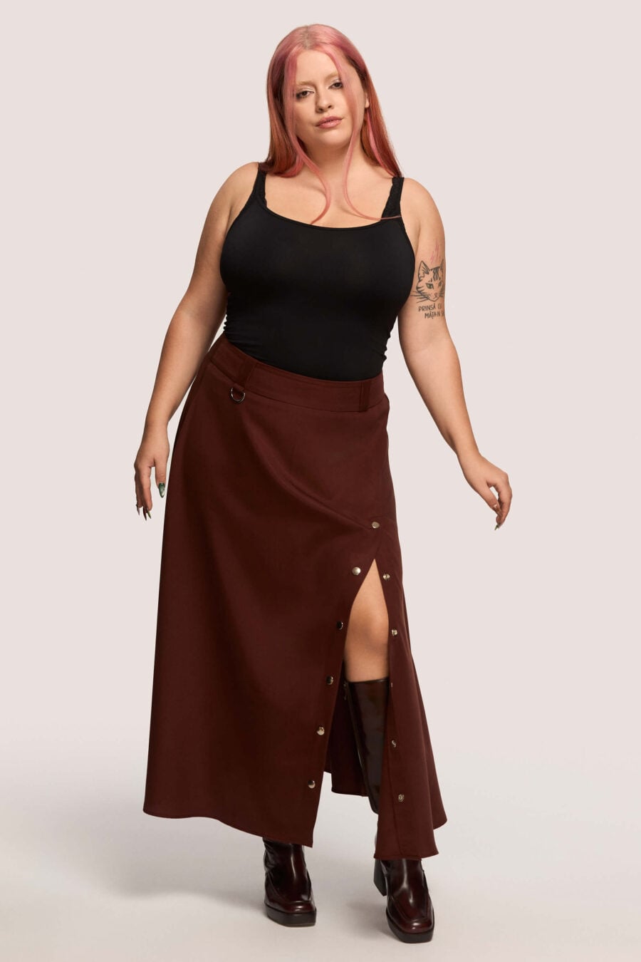 The Vegetarian midi skirt in bordeaux - Made to hold you without squeezing, a shape that follows your rhythm, not the world’s expectations. For long walks, long talks, the long sigh of relief when you finally get home.