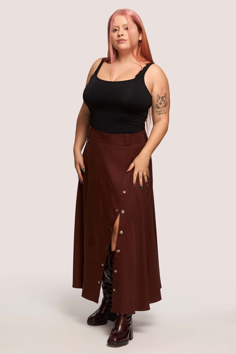 The Vegetarian midi skirt in bordeaux - Made to hold you without squeezing, a shape that follows your rhythm, not the world’s expectations. For long walks, long talks, the long sigh of relief when you finally get home.