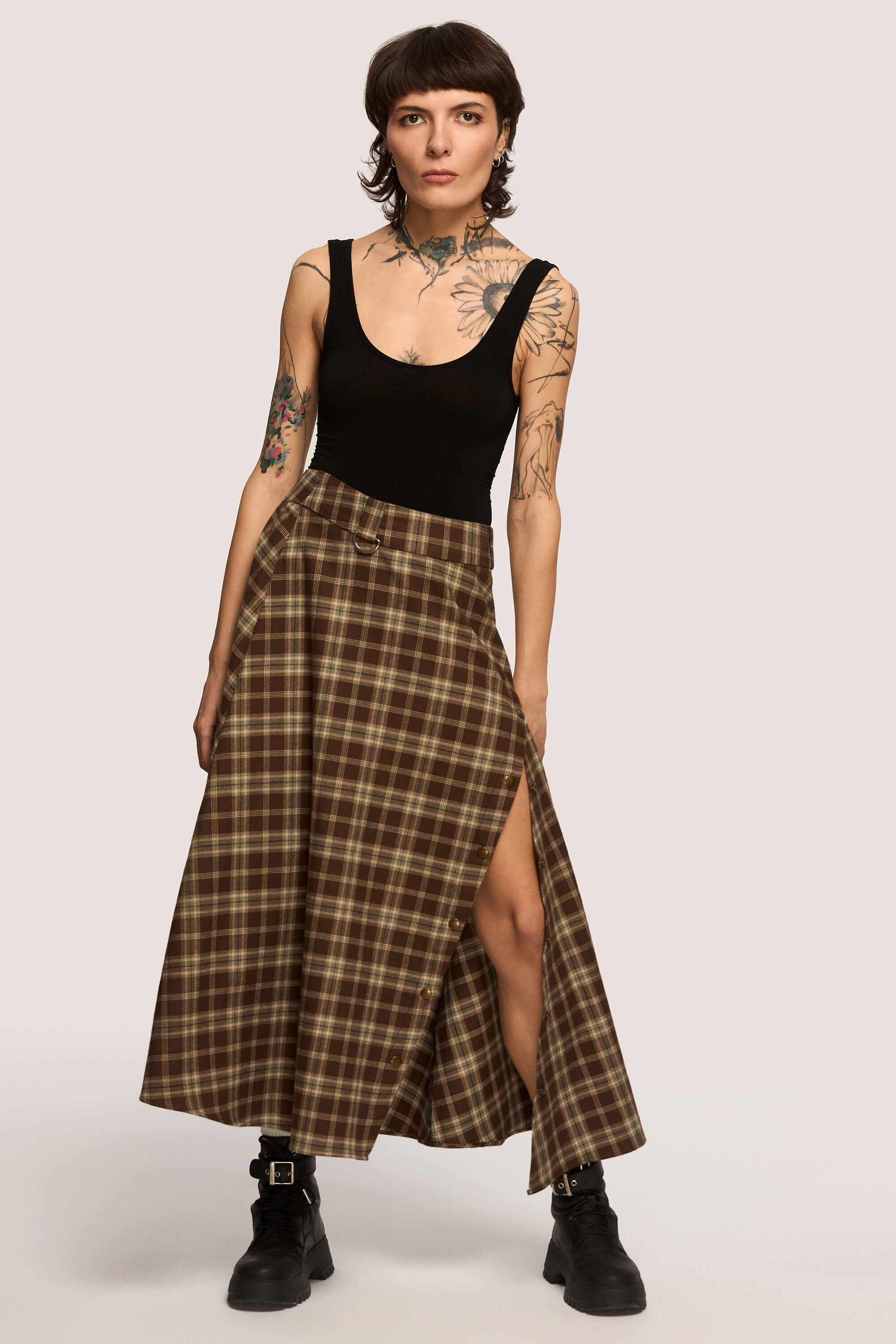 Winter 2025 The Vegetarian Midi Skirt In Chestnut Plaid 3 The Vegetarian Midi Skirt In Chestnut Plaid The Vegetarian midi skirt in chestnut plaid Made to hold you without squeezing, a shape that follows your rhythm, not the world’s expectations. For long walks, long talks, the long sigh of relief when you finally get home.