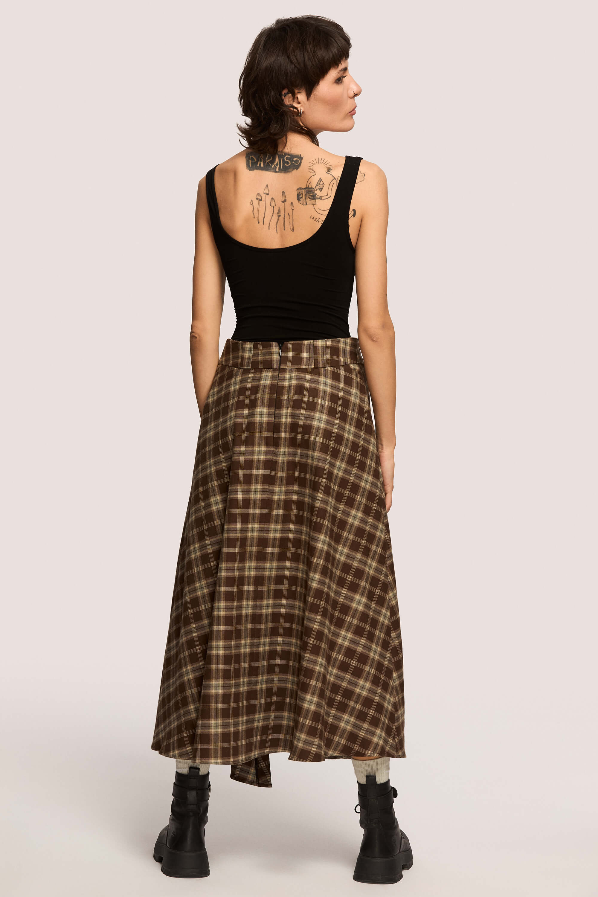 Winter 2025 The Vegetarian Midi Skirt In Chestnut Plaid 4 The Vegetarian Midi Skirt In Chestnut Plaid The Vegetarian midi skirt in chestnut plaid Made to hold you without squeezing, a shape that follows your rhythm, not the world’s expectations. For long walks, long talks, the long sigh of relief when you finally get home.