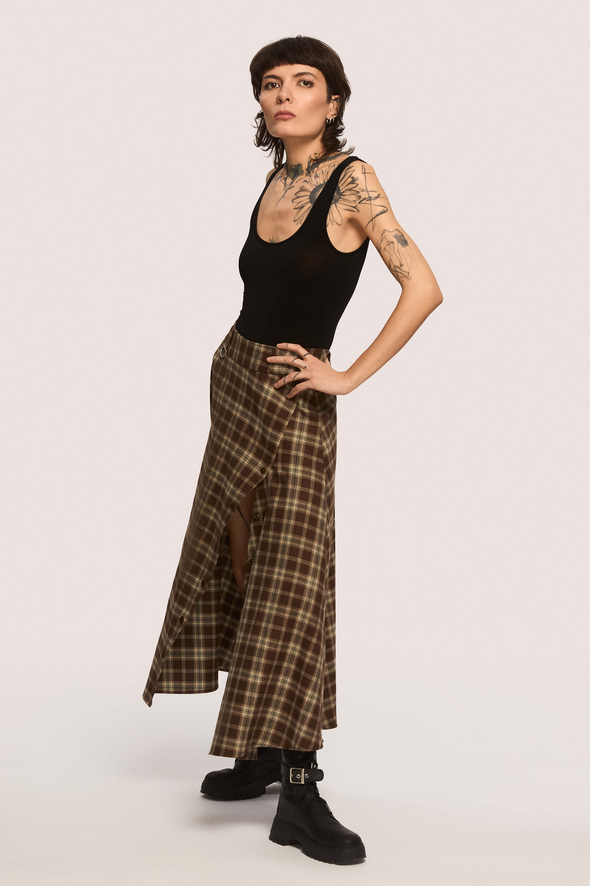 Winter 2025 The Vegetarian Midi Skirt In Chestnut Plaid 5 The Vegetarian Midi Skirt In Chestnut Plaid The Vegetarian midi skirt in chestnut plaid Made to hold you without squeezing, a shape that follows your rhythm, not the world’s expectations. For long walks, long talks, the long sigh of relief when you finally get home.