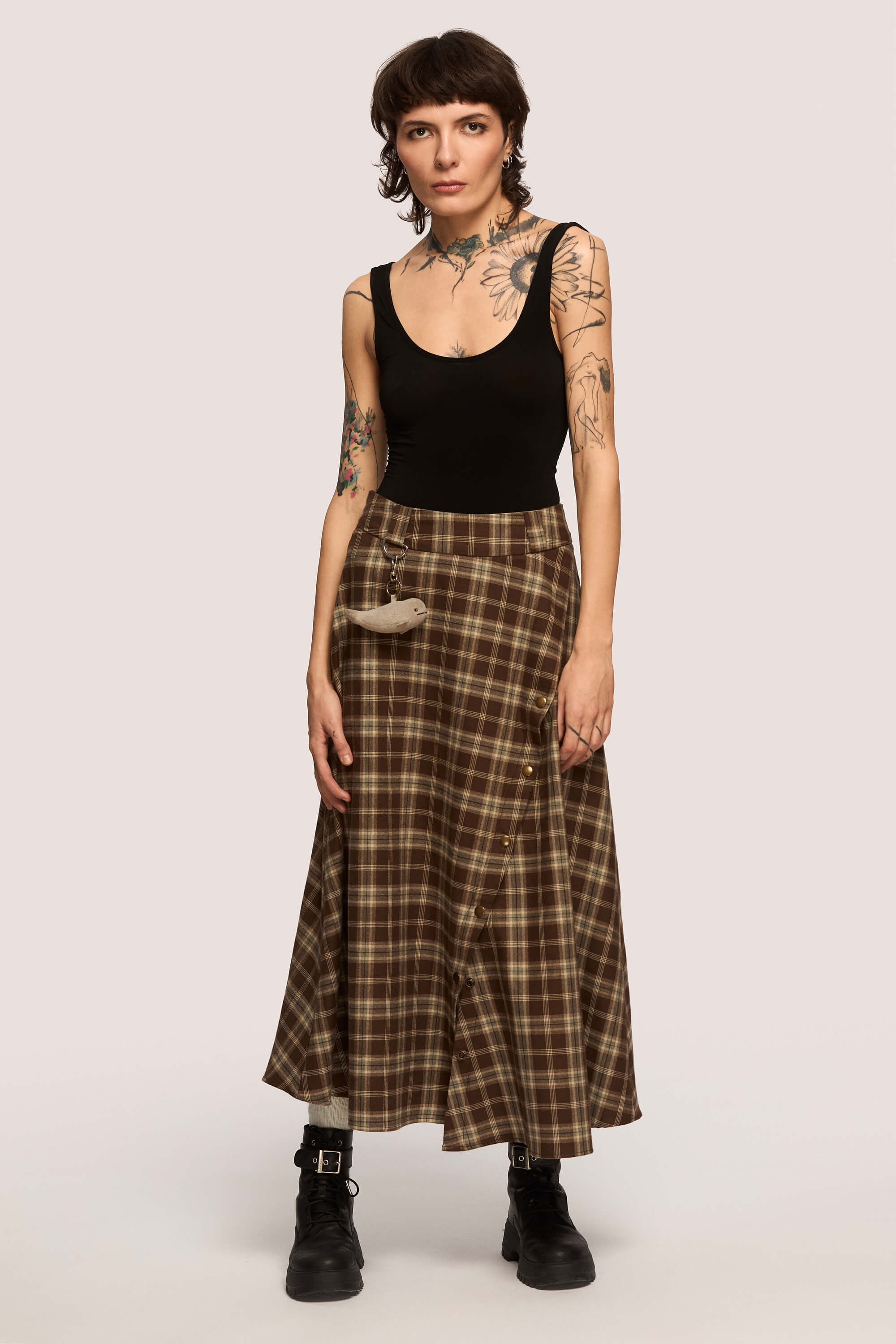 Winter 2025 The Vegetarian Midi Skirt In Chestnut Plaid 7 The Vegetarian Midi Skirt In Chestnut Plaid The Vegetarian midi skirt in chestnut plaid Made to hold you without squeezing, a shape that follows your rhythm, not the world’s expectations. For long walks, long talks, the long sigh of relief when you finally get home.
