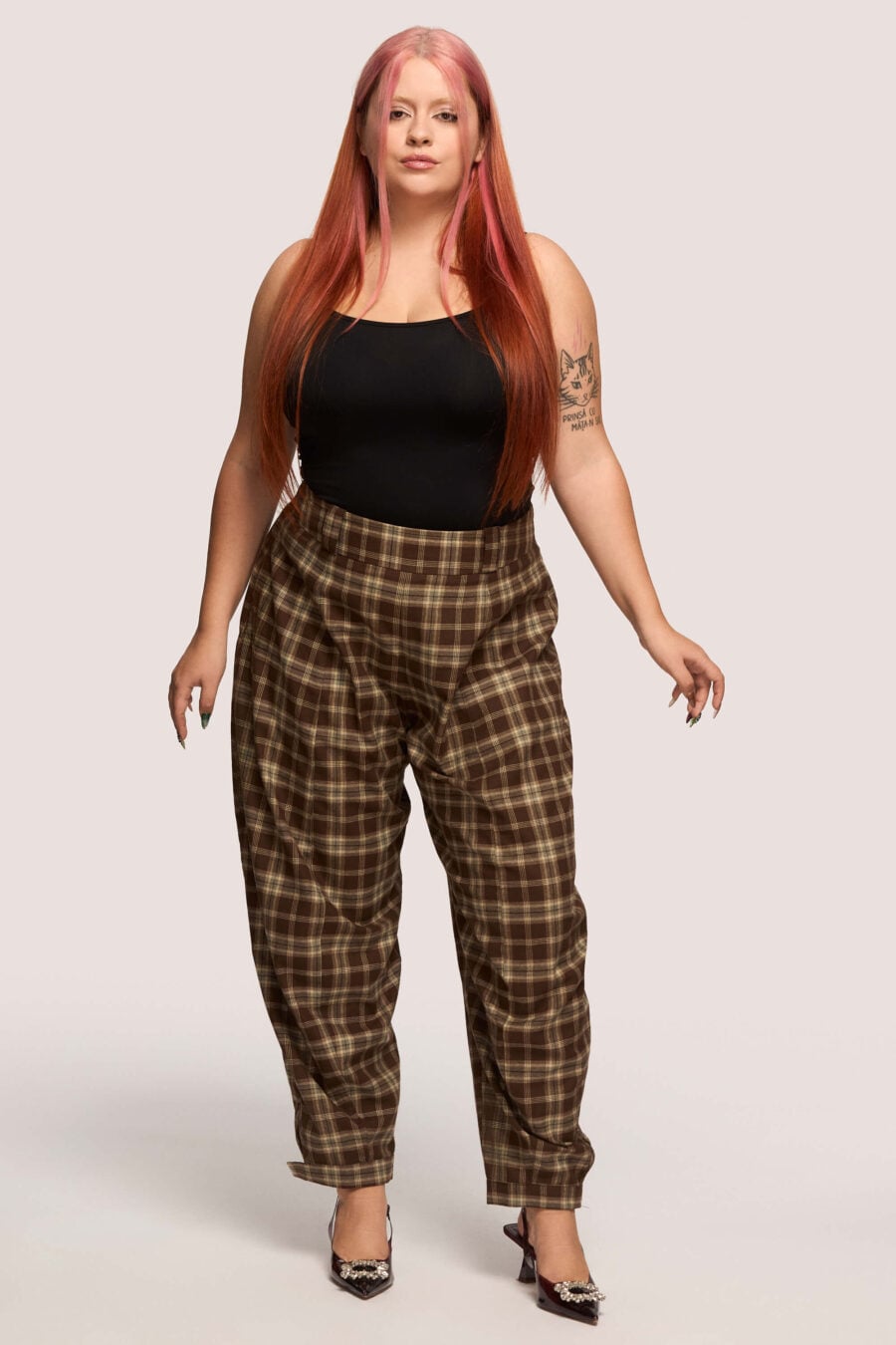 Troublemaker barrel leg pants in chestnut plaid  Designed for sitting, pacing, speaking up, walking away – a shape that shifts with you, not against you, with room for everything you carry. A fit that stays kind, even when the day isn’t.