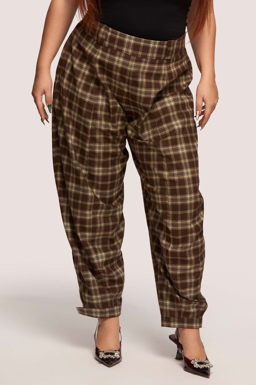 Troublemaker barrel leg pants in chestnut plaid - Designed for sitting, pacing, speaking up, walking away – a shape that shifts with you, not against you, with room for everything you carry. A fit that stays kind, even when the day isn’t.