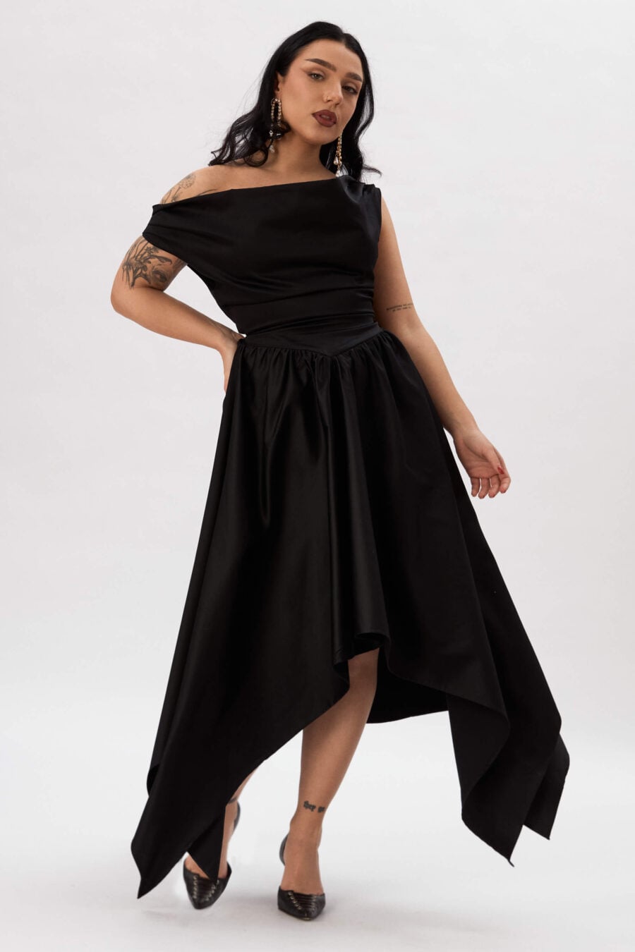 Delta of Venus corset dress in raven  A silhouette that doesn’t ask you to shrink.