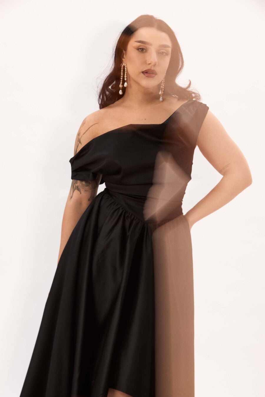Delta of Venus corset dress in raven - A silhouette that doesn’t ask you to shrink.