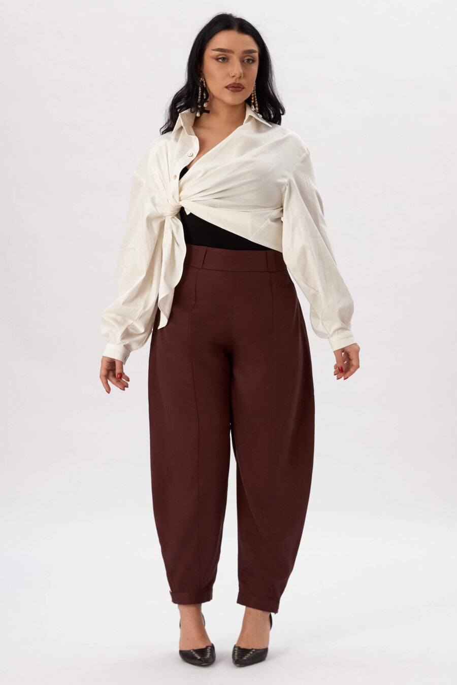 Troublemaker barrel leg pants in bordeaux - Designed for sitting, pacing, speaking up, walking away – a shape that shifts with you, not against you, with room for everything you carry. A fit that stays kind, even when the day isn’t.