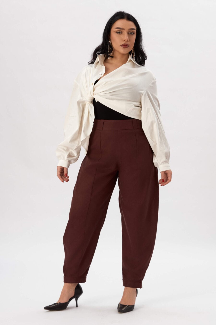 Troublemaker barrel leg pants in bordeaux - Designed for sitting, pacing, speaking up, walking away – a shape that shifts with you, not against you, with room for everything you carry. A fit that stays kind, even when the day isn’t.