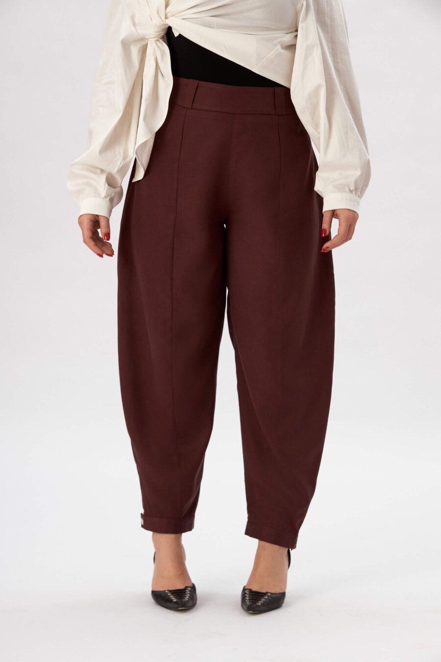 Troublemaker barrel leg pants in bordeaux - Designed for sitting, pacing, speaking up, walking away – a shape that shifts with you, not against you, with room for everything you carry. A fit that stays kind, even when the day isn’t.