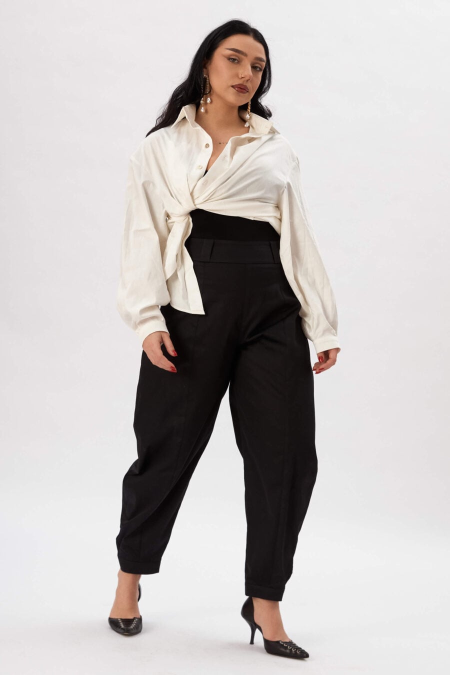 Troublemaker barrel leg pants in raven - Designed for sitting, pacing, speaking up, walking away – a shape that shifts with you, not against you, with room for everything you carry. A fit that stays kind, even when the day isn’t.