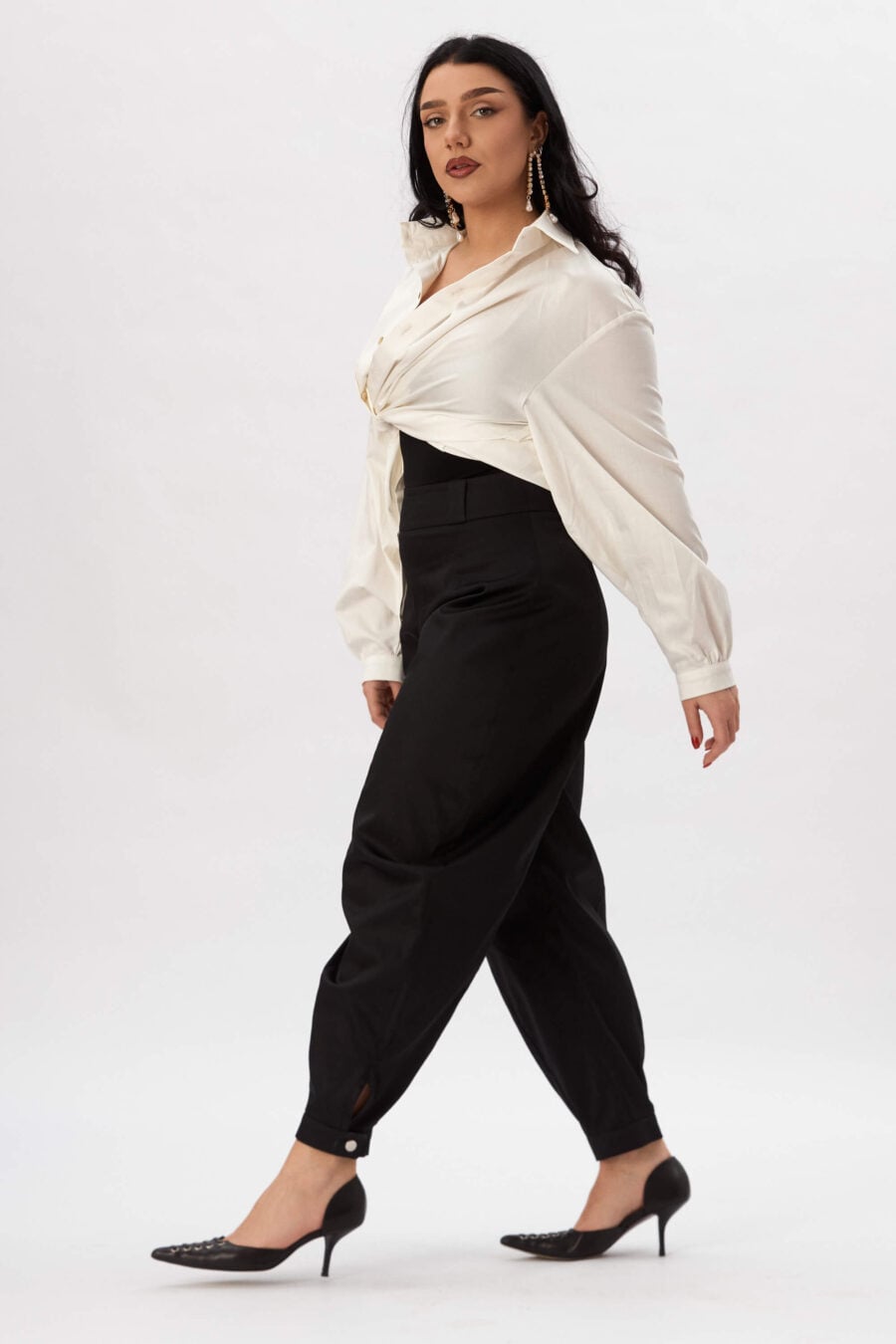 Troublemaker barrel leg pants in raven - Designed for sitting, pacing, speaking up, walking away – a shape that shifts with you, not against you, with room for everything you carry. A fit that stays kind, even when the day isn’t.