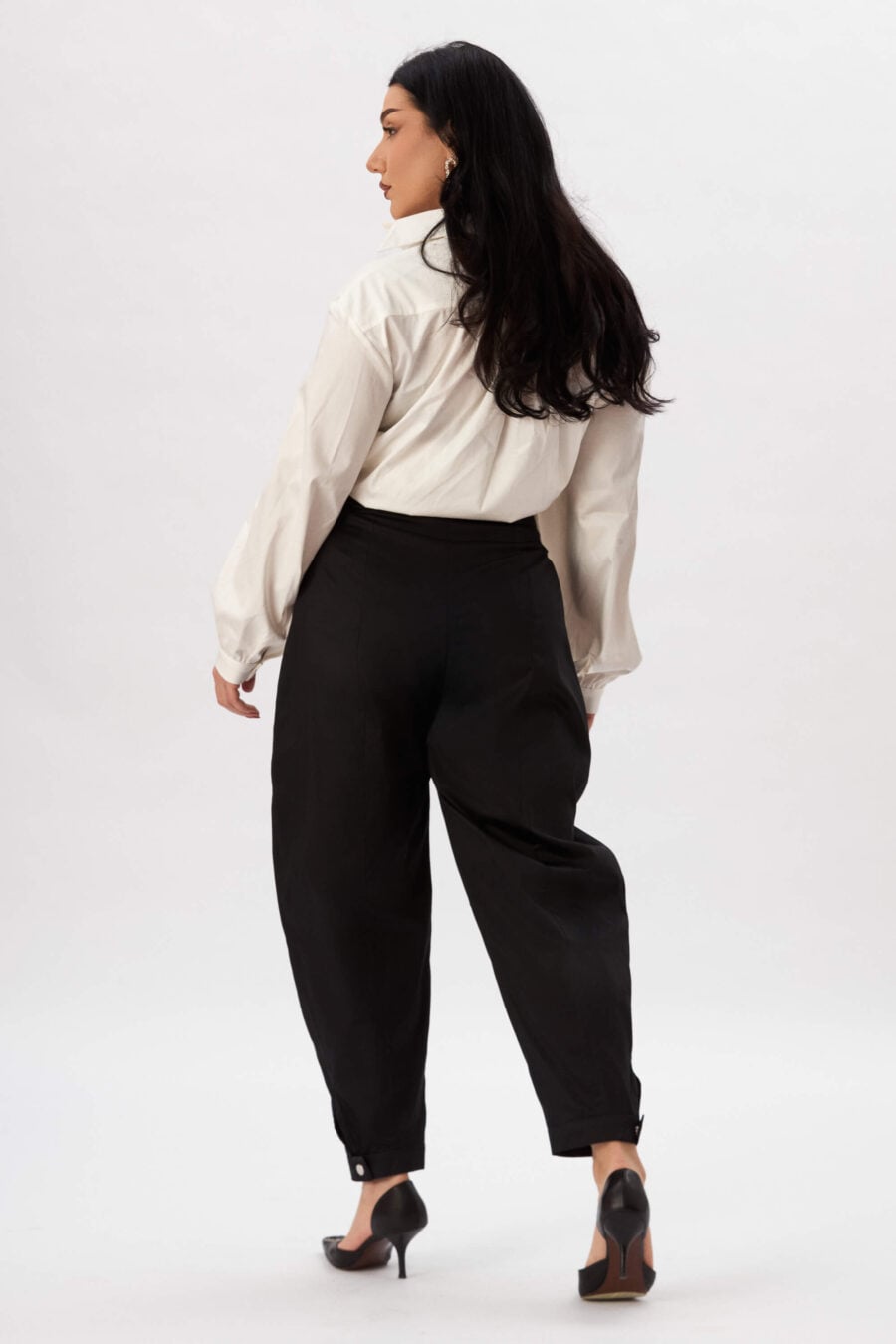 Troublemaker barrel leg pants in raven - Designed for sitting, pacing, speaking up, walking away – a shape that shifts with you, not against you, with room for everything you carry. A fit that stays kind, even when the day isn’t.