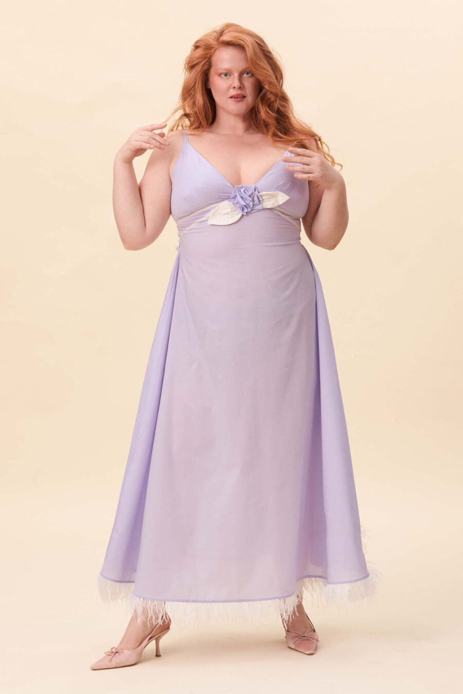 Gone Girl slip dress in lavender voille - An elongated silhouette designed to move with ease. The focus gathers at the bust, to a sculptural rose from which two slender lines fall, guiding the eye downward and wrapping into a corset at the back. Form shaped through tension and release.