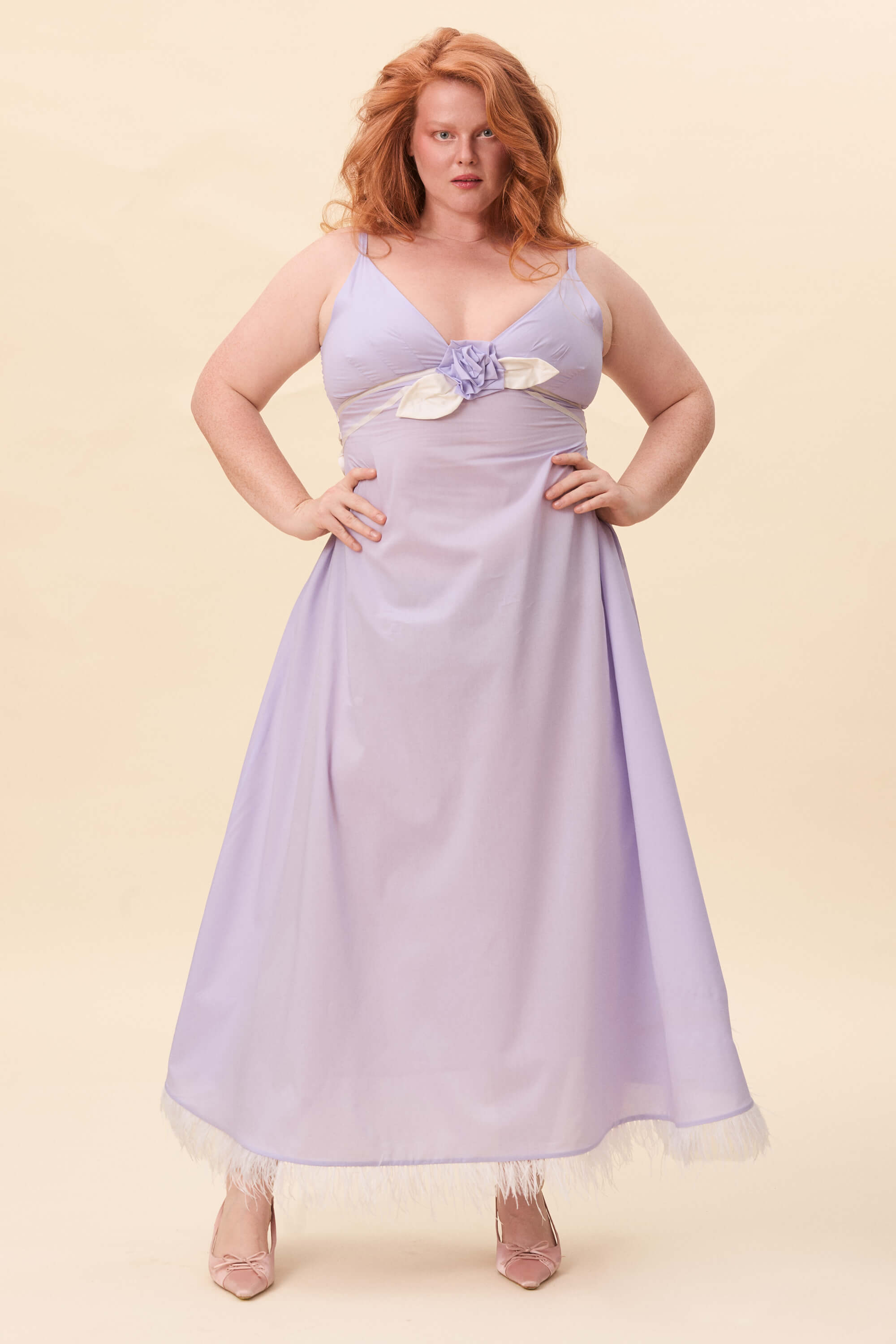 Spring 2026 Gone Girl Slip Dress In Lavender Voille 3 Gone Girl Slip Dress In Lavender Voille Gone Girl slip dress in lavender voille An elongated silhouette designed to move with ease. The focus gathers at the bust, to a sculptural rose from which two slender lines fall, guiding the eye downward and wrapping into a corset at the back. Form shaped through tension and release.