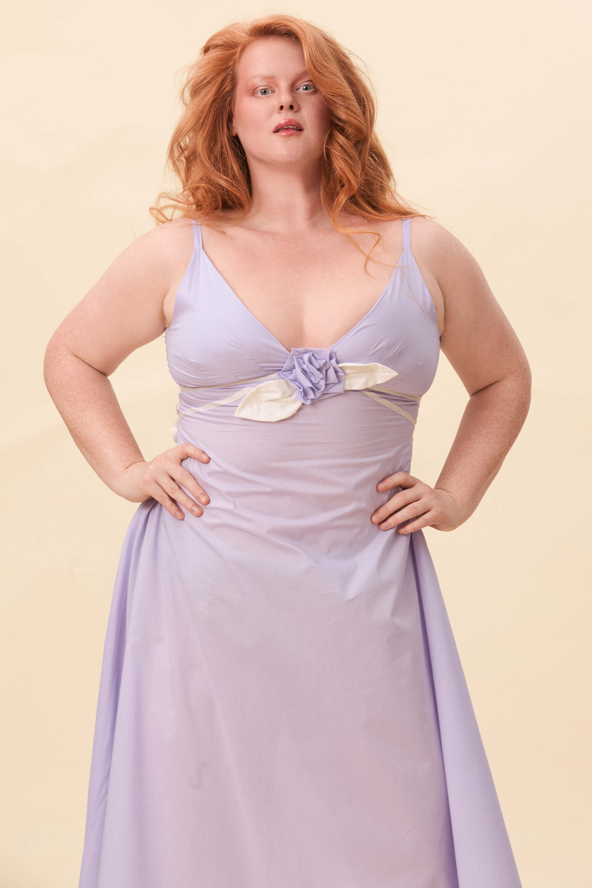 Spring 2026 Gone Girl Slip Dress In Lavender Voille 4 Gone Girl Slip Dress In Lavender Voille Gone Girl slip dress in lavender voille An elongated silhouette designed to move with ease. The focus gathers at the bust, to a sculptural rose from which two slender lines fall, guiding the eye downward and wrapping into a corset at the back. Form shaped through tension and release.