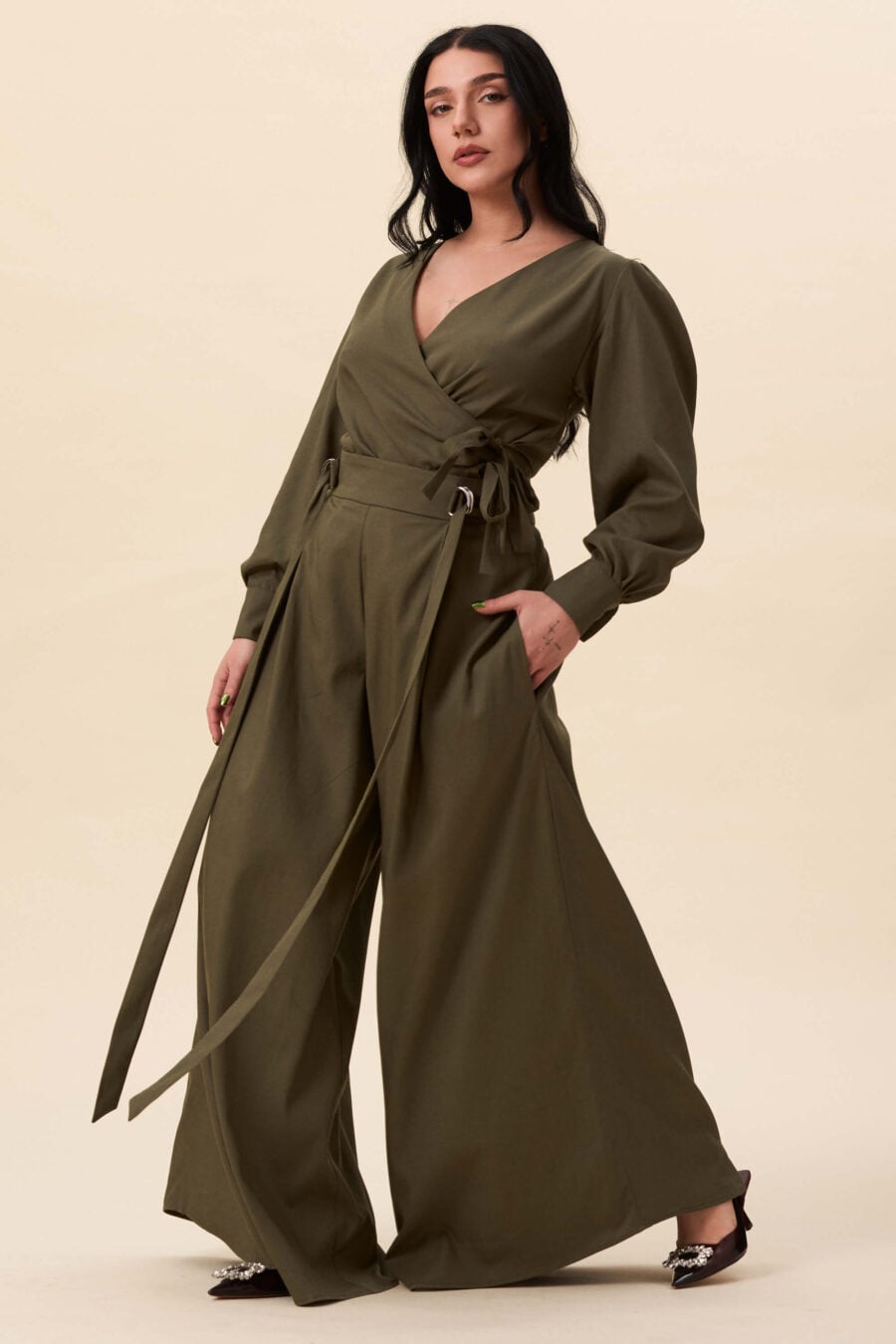Strong Poison wrap shirt in olive green - A wrap shirt shaped through angled lines rather than volume. The front crosses into a sharp, pointed hem, fastening with slender ties at the side. Sleeves are softly structured, finished with extended cuffs.